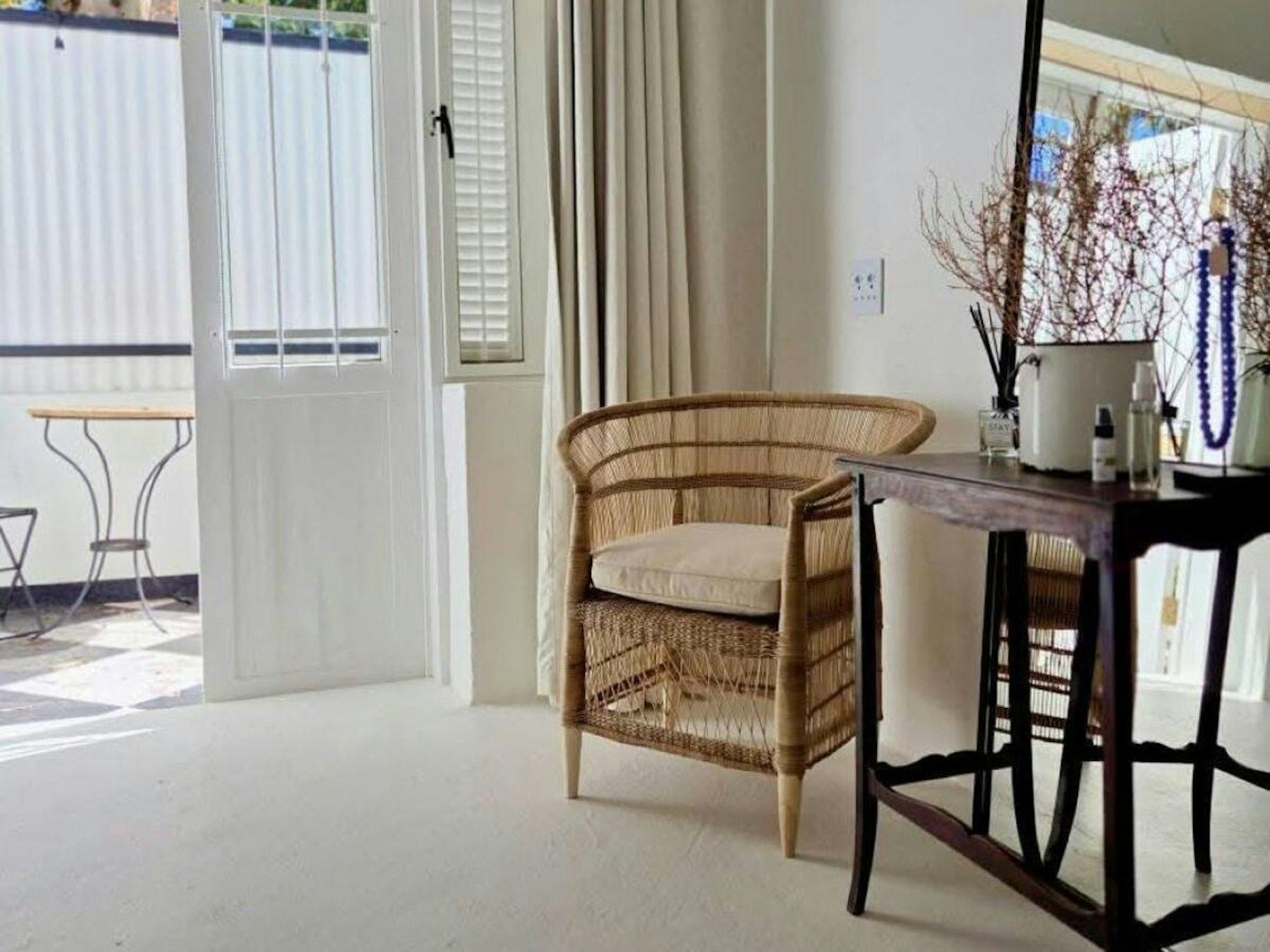 Rattan chair by the door