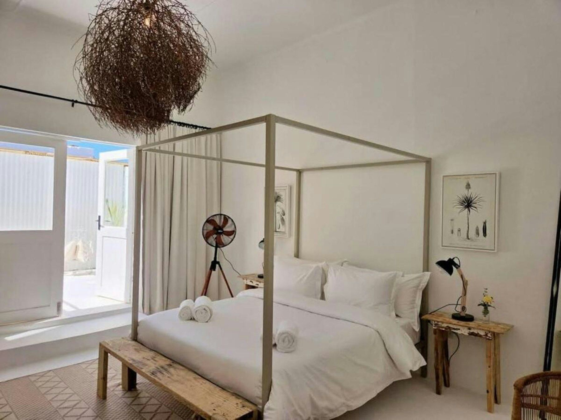 Bedroom with wooden four-poster