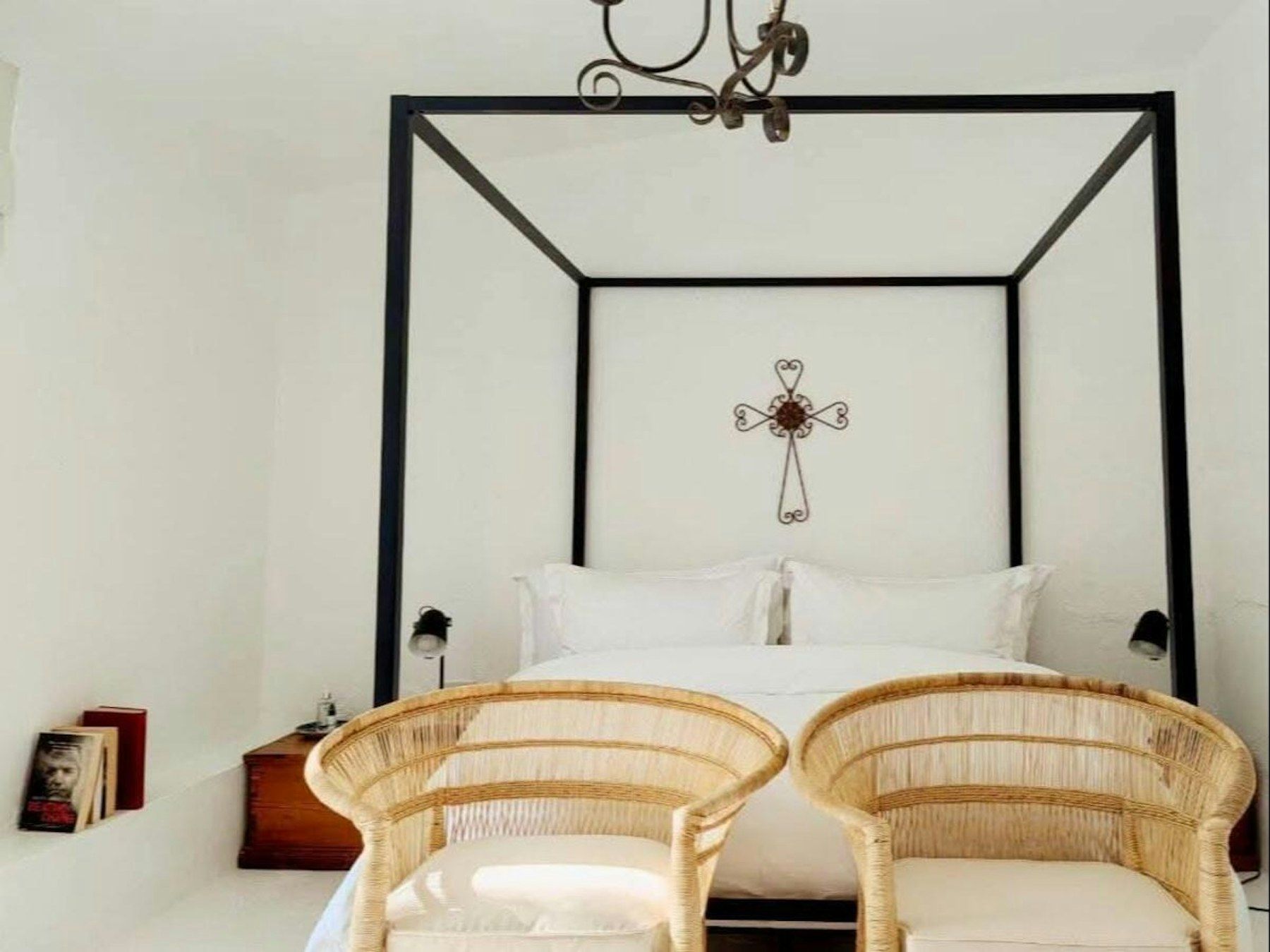 Bedroom with rattan chairs